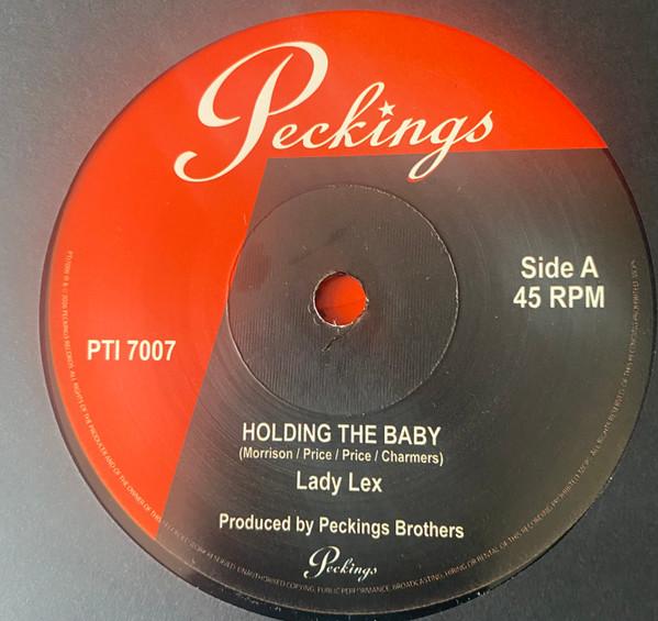 Lady Lex - Holding the baby 